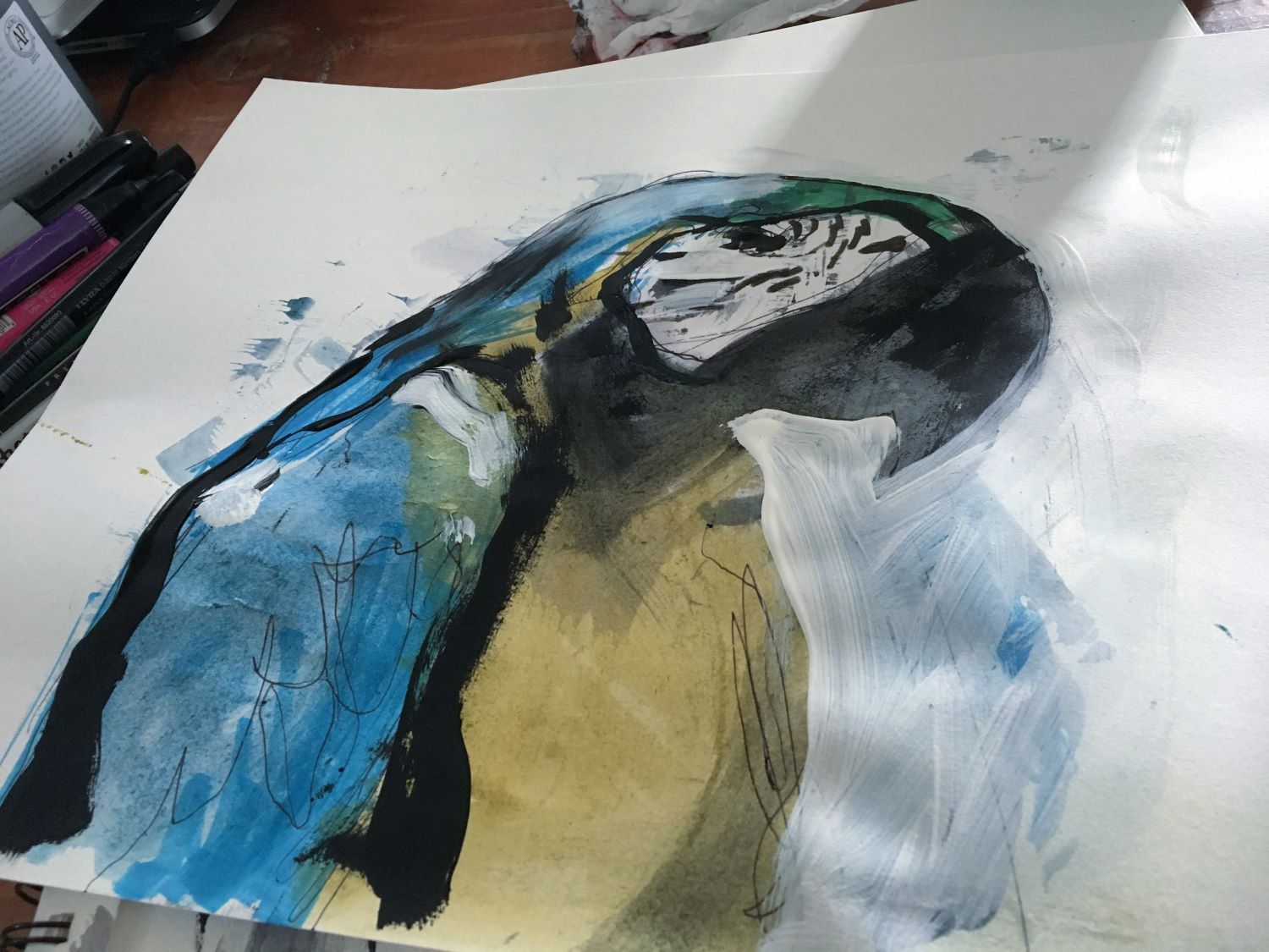 Blue and gold macaw mixed media drawing by wildlife artist Chris Wilson